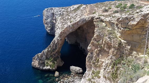Blue Grotto sea cave, southern Malta — a breath between acts