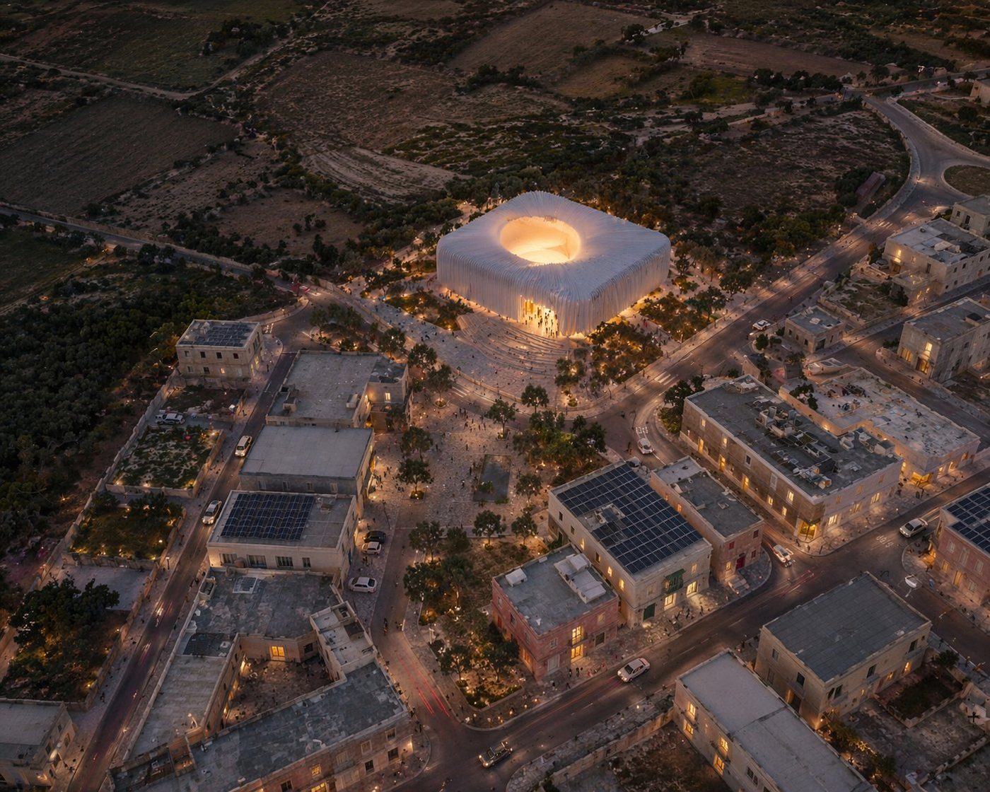 Cultural anchor in the village, aerial dusk